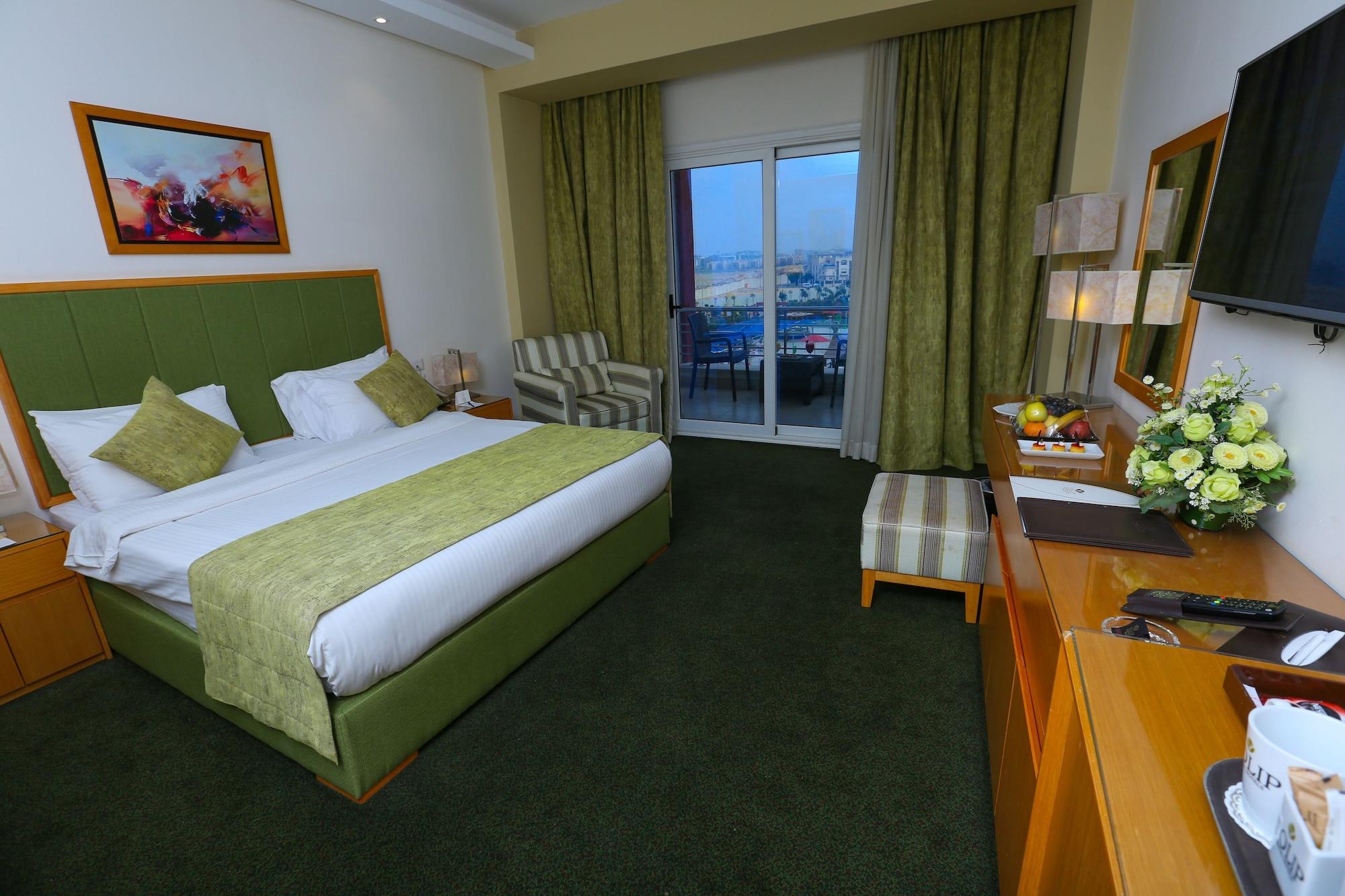 Hotel Tolip El Narges El El Cairo Exterior foto A room at the hotel